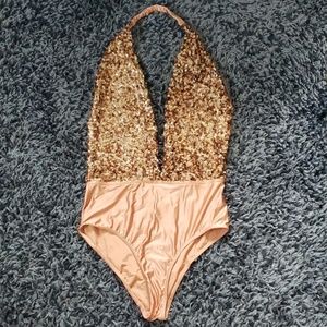 Sequined halter bodysuit.